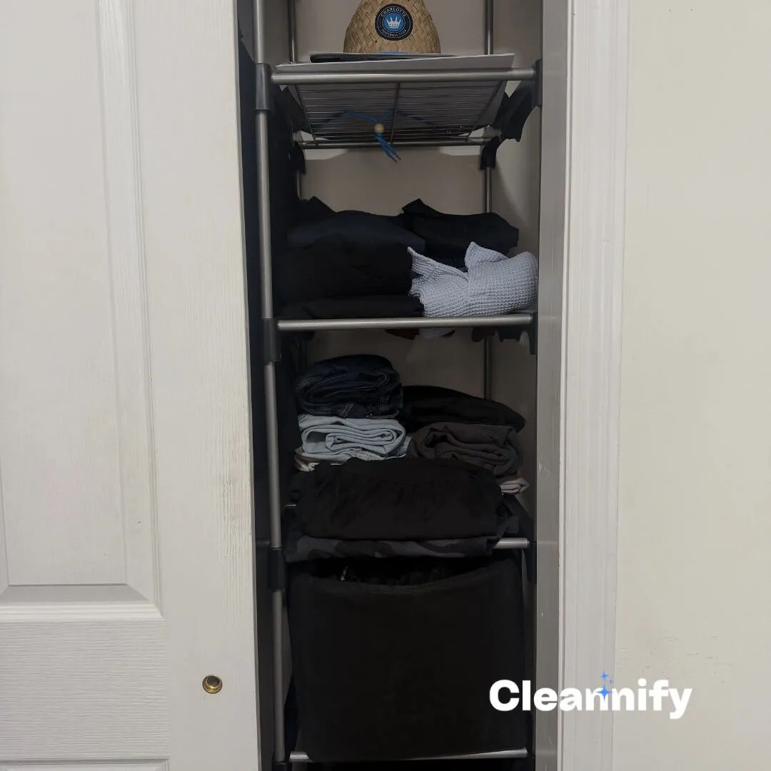 After closet organization in Charlotte showing folded clothes on shelves